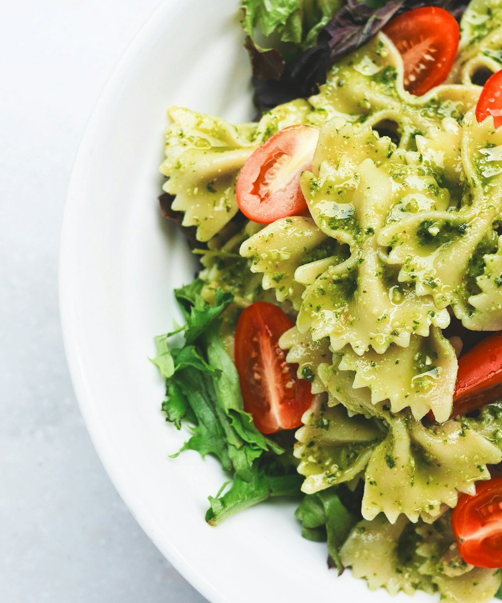 A green hand-rolled pasta dish